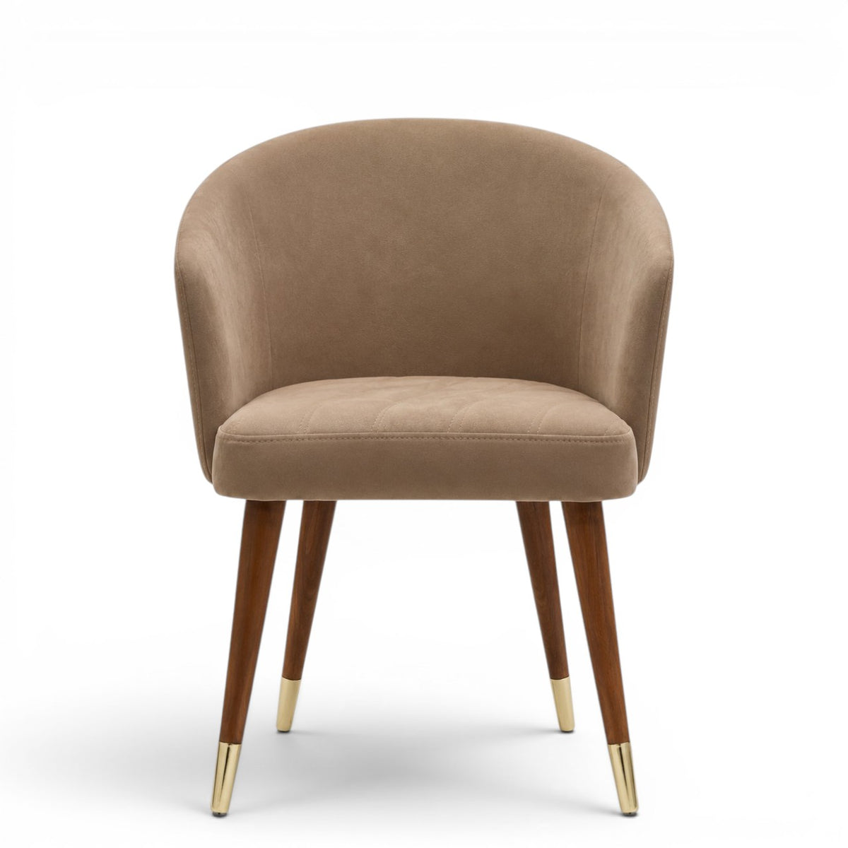 A modern dining chair with a curved, tufted backrest and seat upholstered in a warm taupe-beige fabric, supported by four tapered dark brown wooden legs with gold metal caps, shown against a plain white background.