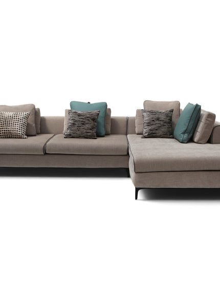 A modern sectional sofa in taupe fabric with multiple decorative throw pillows, shown against a plain white background.