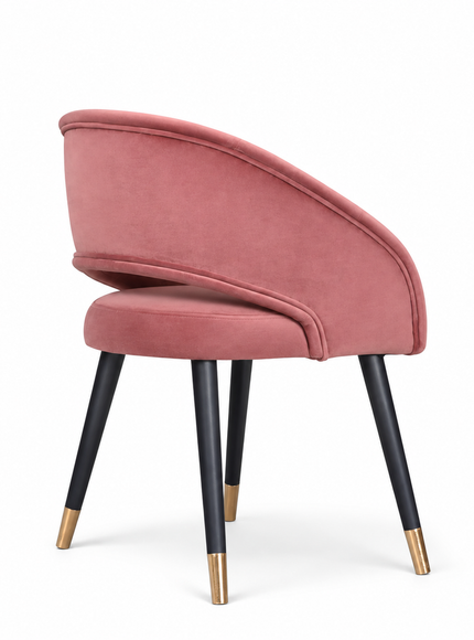 Rosado dusty pink velvet dining chair with curved wraparound backrest, black tapered legs and gold tips.