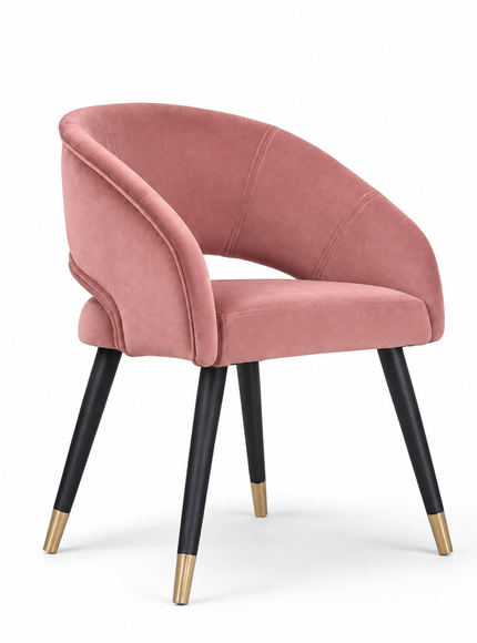 Rosado dusty pink velvet dining chair with curved wraparound backrest, black tapered legs and gold tips.