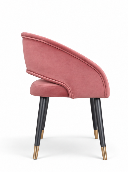 Rosado dusty pink velvet dining chair with curved wraparound backrest, black tapered legs and gold tips.