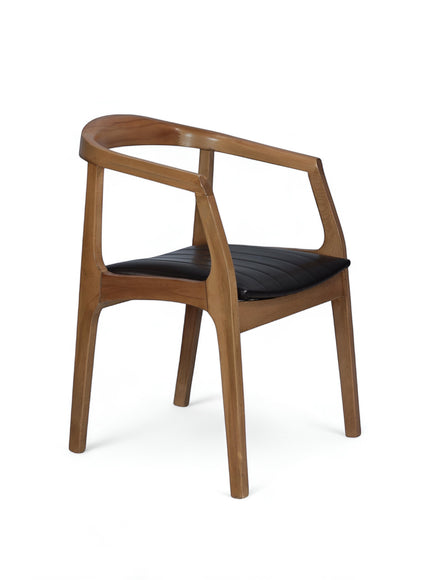 Product view of the Vaya Home Abre dining chair with a curved wood frame and black upholstered seat.