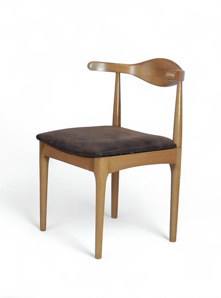 Opposite front angled view of the Vaya Home Albero dining chair with a wood frame and brown upholstered seat.