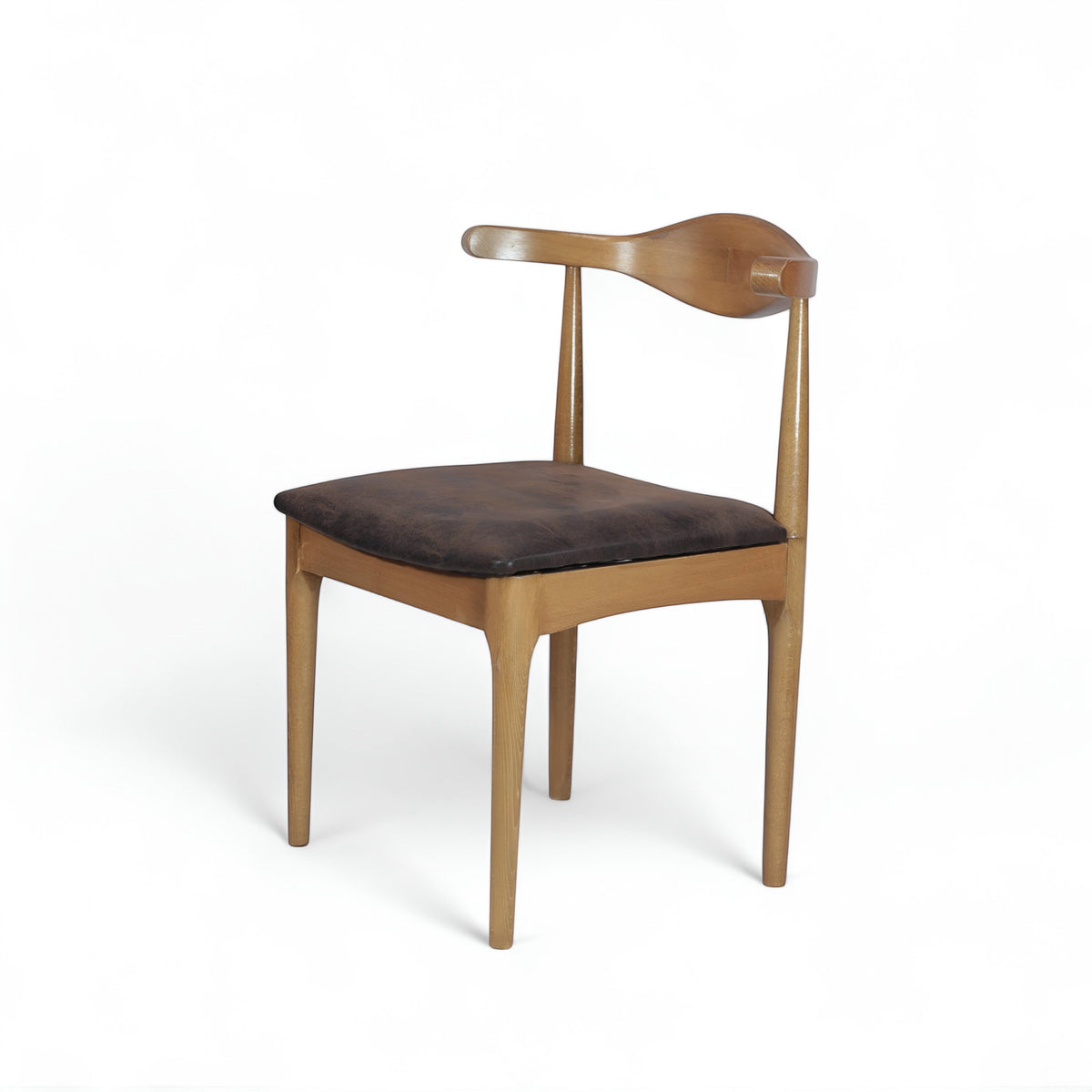 Opposite front angled view of the Vaya Home Albero dining chair with a wood frame and brown upholstered seat.