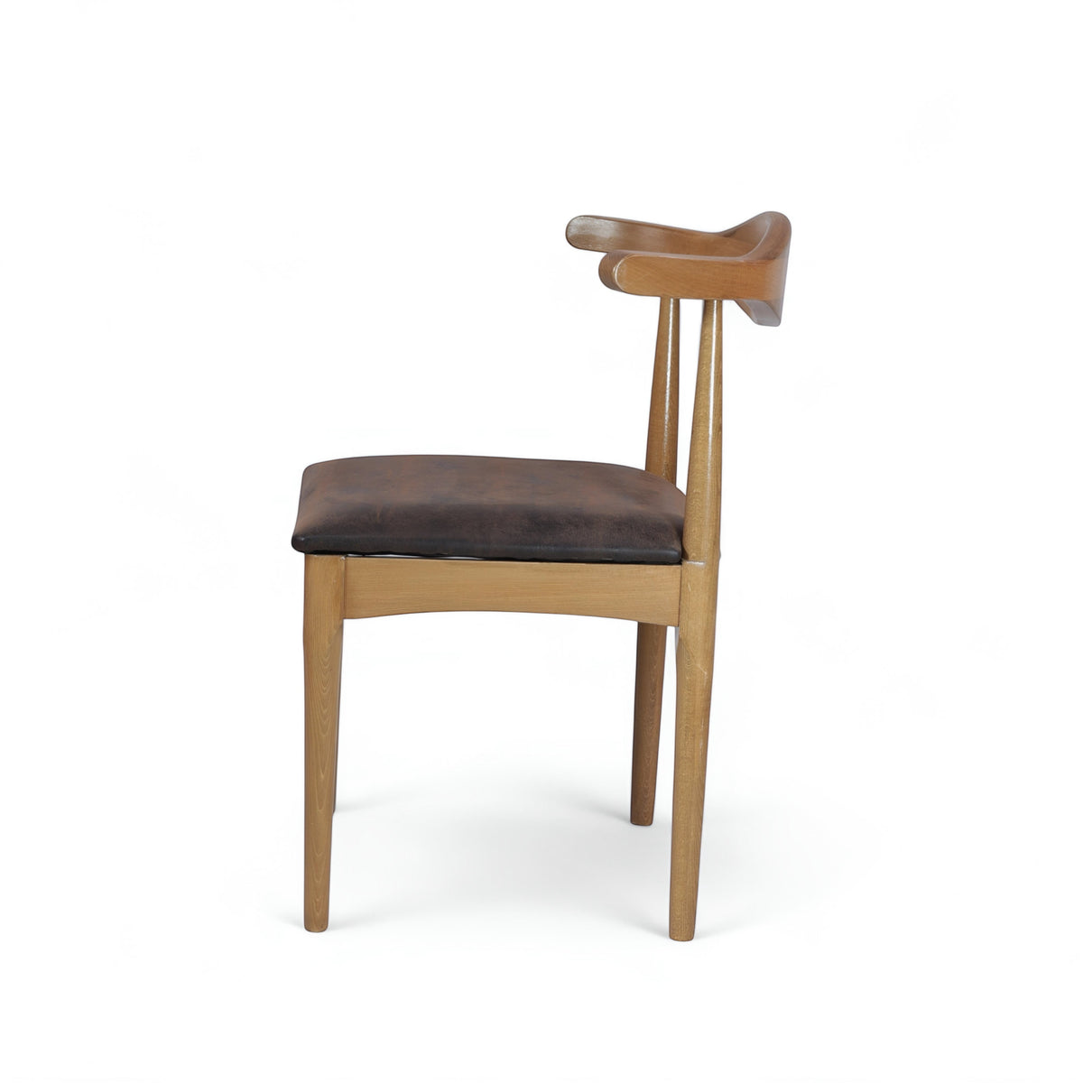 Opposite side view of the Vaya Home Albero dining chair featuring a sculpted wood backrest and brown upholstered seat.