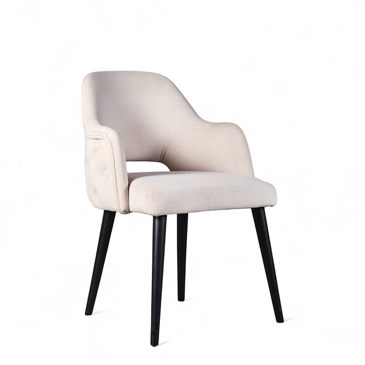 Front angled view of the Vaya Home Alt dining chair with white upholstery, integrated arms, and black tapered legs.