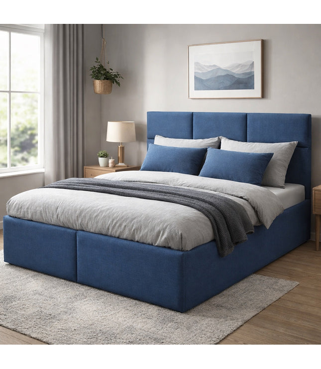 Vaya Home Alturo upholstered bed in blue fabric with a paneled headboard, styled in a modern bedroom.