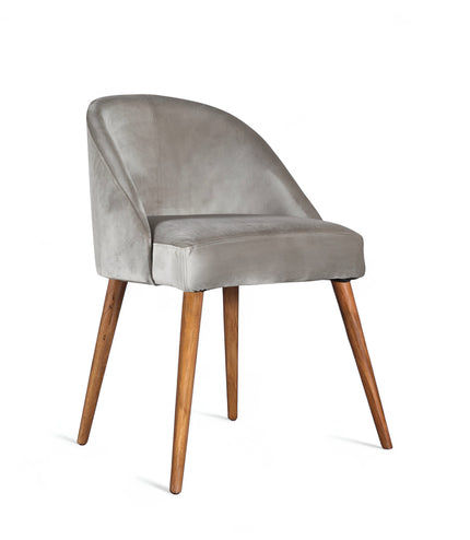 Front angled view of the Vaya Home Alveare dining chair with gray upholstery and tapered wood legs.