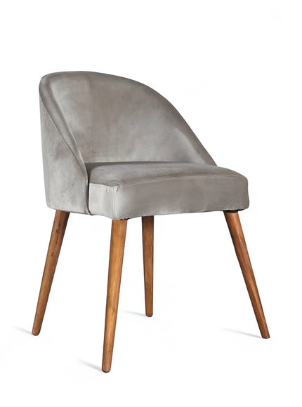 Front angled view of the Vaya Home Alveare dining chair with gray upholstery and tapered wood legs.