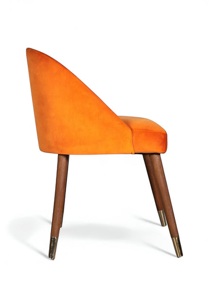 Front view of the Vaya Home Alveare dining chair with orange upholstery and tapered wood legs.
