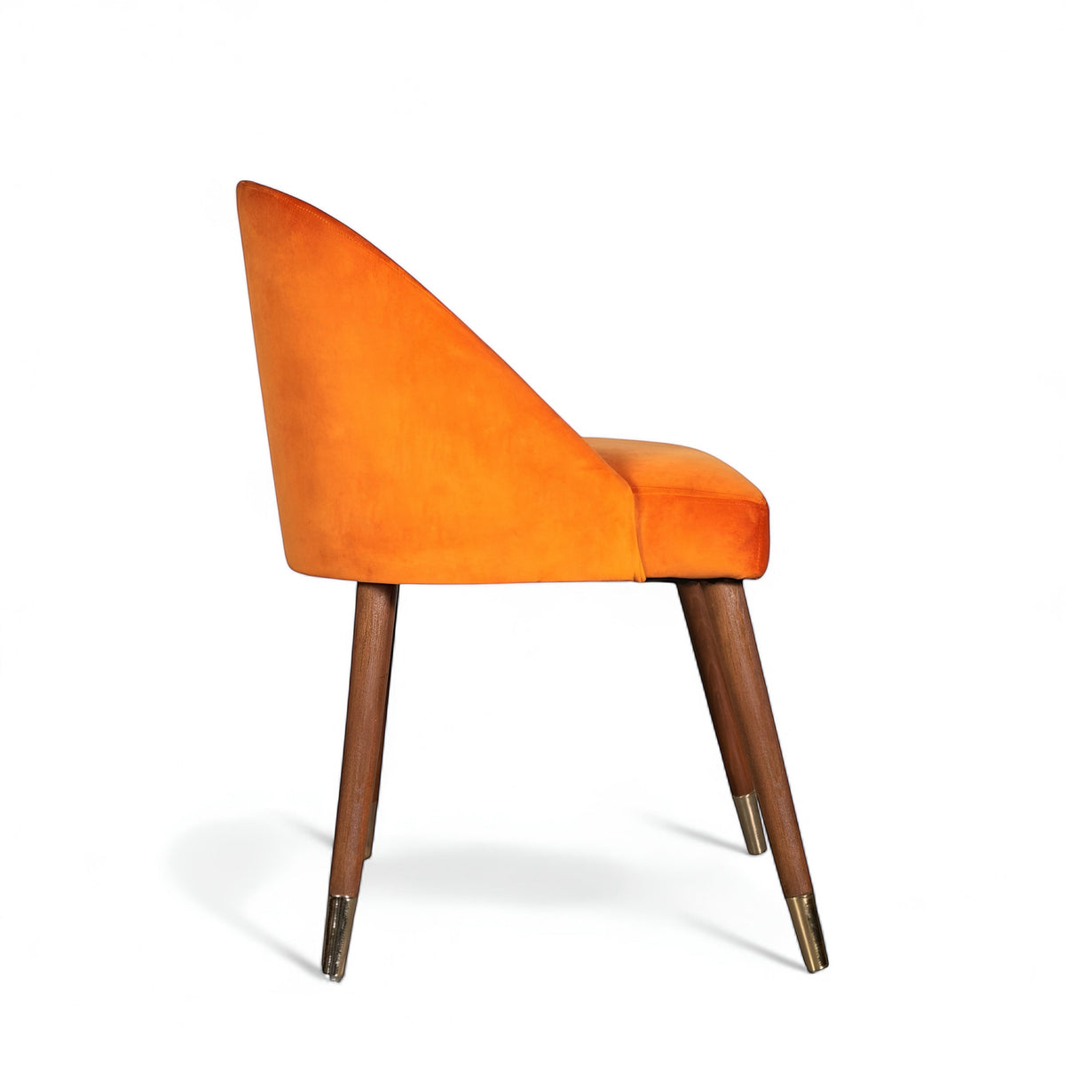 Front view of the Vaya Home Alveare dining chair with orange upholstery and tapered wood legs.