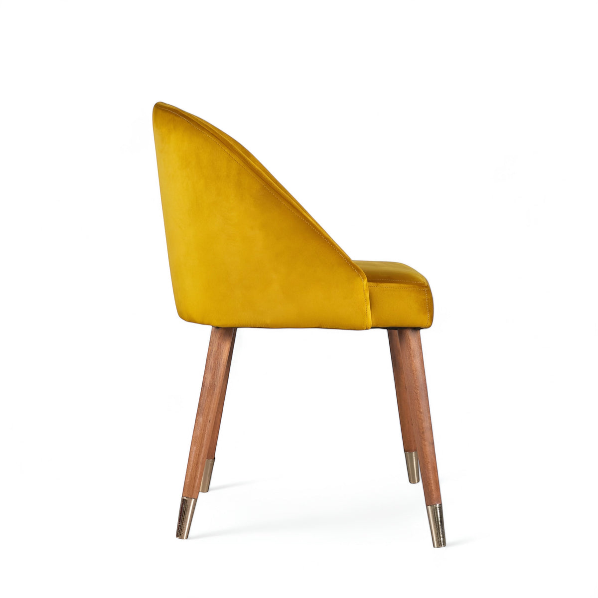 Side view of the Vaya Home Alveare dining chair featuring yellow upholstery and tapered wood legs.