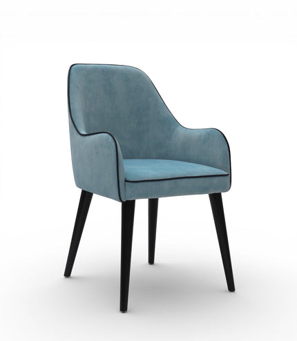Vaya Home Alven dining chair with blue upholstery, curved arms, and black tapered legs.