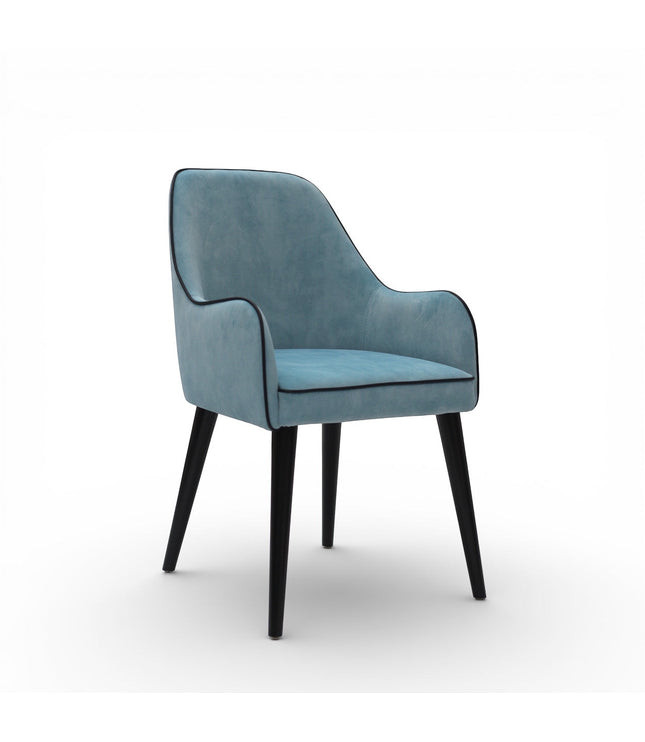 Vaya Home Alven dining chair with blue upholstery, curved arms, and black tapered legs.