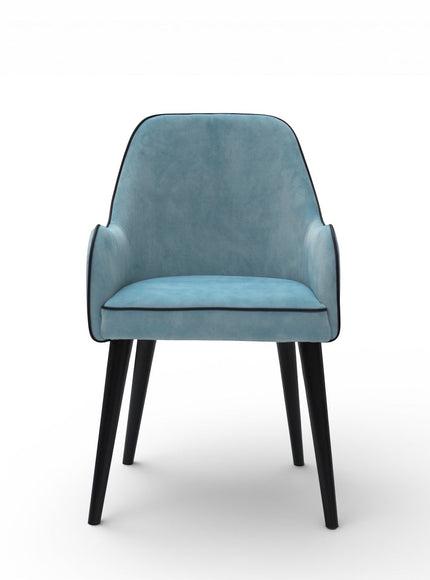 Front view of the Vaya Home Alven dining chair featuring blue upholstery, slim armrests, and black legs.