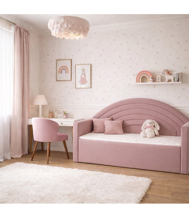 Vaya Home Antigo pink accent chair with wood legs, styled in a soft pink kids bedroom beside the Rainbow bed.