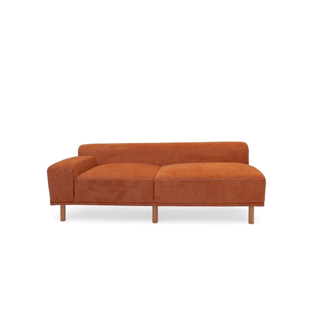 Front view of the Vaya Home Arancio 2-seat module in rust orange upholstery.