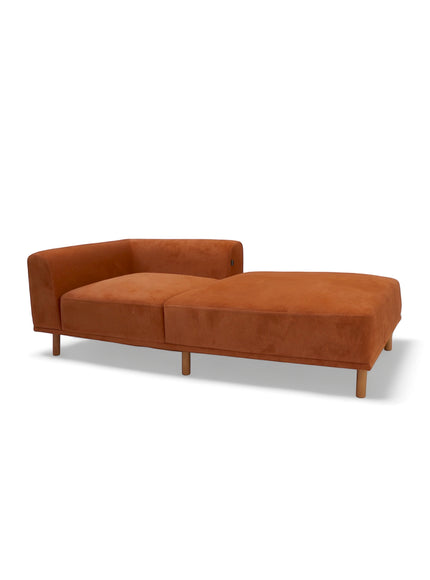 Vaya Home Arancio lounge module in rust orange upholstery with an extended chaise-style seat.