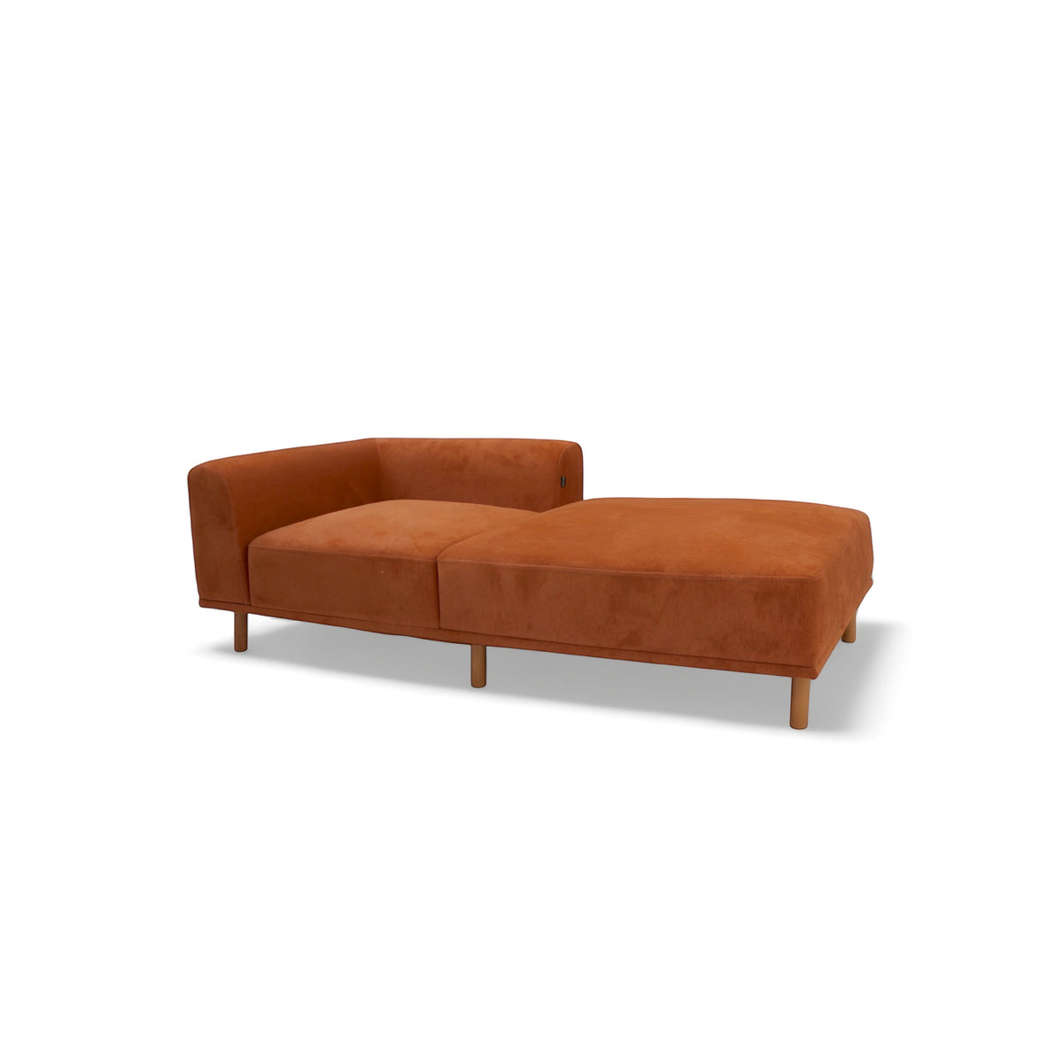 Vaya Home Arancio lounge module in rust orange upholstery with an extended chaise-style seat.