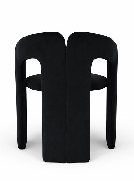 Back view of the Vaya Home Arcadia accent chair with a rounded black upholstered back and bold sculptural frame.
