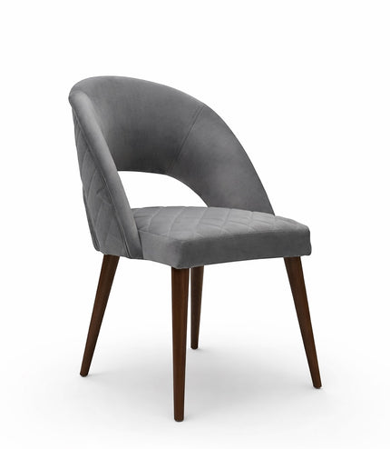 Vaya Home Argent dining chair with grey upholstery, open curved backrest, and tapered wood legs.
