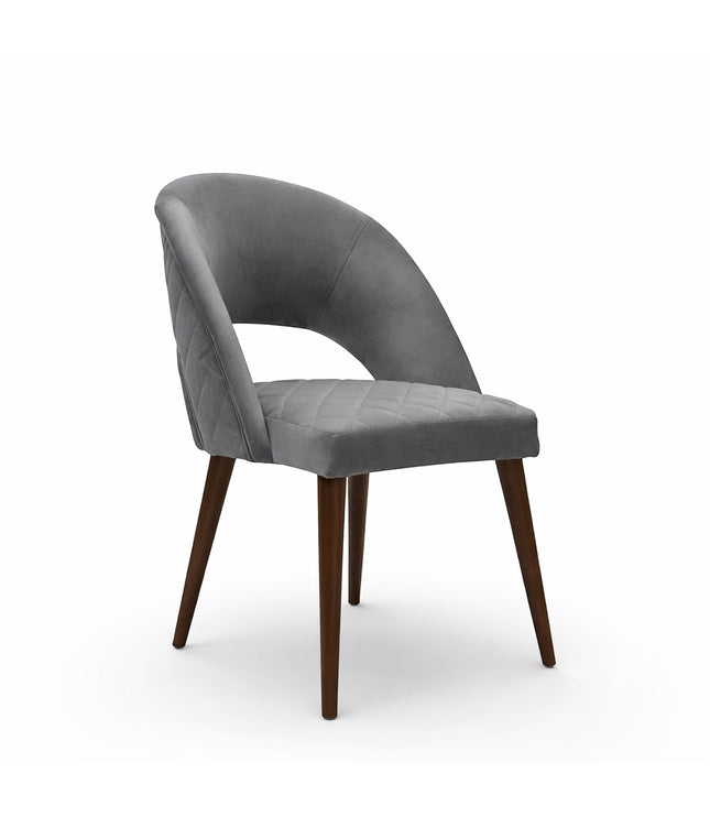 Vaya Home Argent dining chair with grey upholstery, open curved backrest, and tapered wood legs.