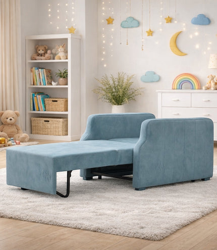 Vaya Home Aristo chair bed in blue upholstery, styled in a kids room with the pull-out bed extended.