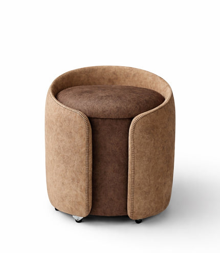 Vaya Home Barrel round storage ottoman in two-tone brown upholstery with cushioned seat.