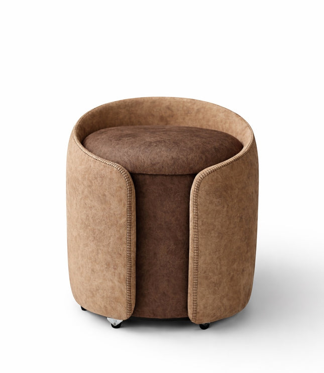 Vaya Home Barrel round storage ottoman in two-tone brown upholstery with cushioned seat.
