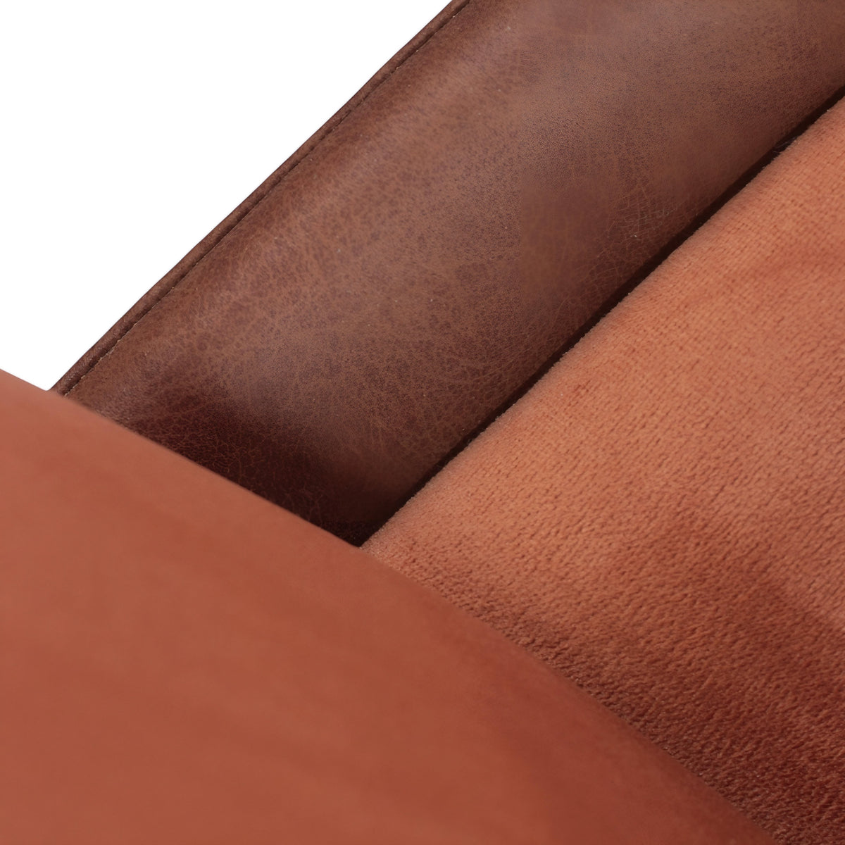 Close-up of the Vaya Home Batata dining chair showing brown upholstery and stitched seam detail.