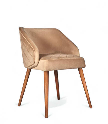 Front angled view of the Vaya Home Biscotta dining chair with beige upholstery, curved arm detail, and tapered wood legs.