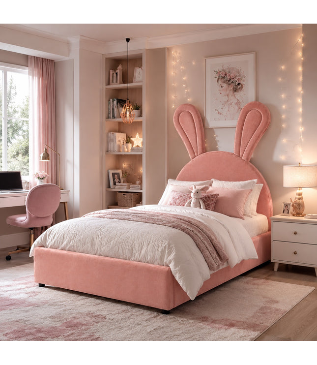 Vaya Home Bunny kids bed in pink upholstery with a bunny ear headboard, styled in a soft pastel bedroom.