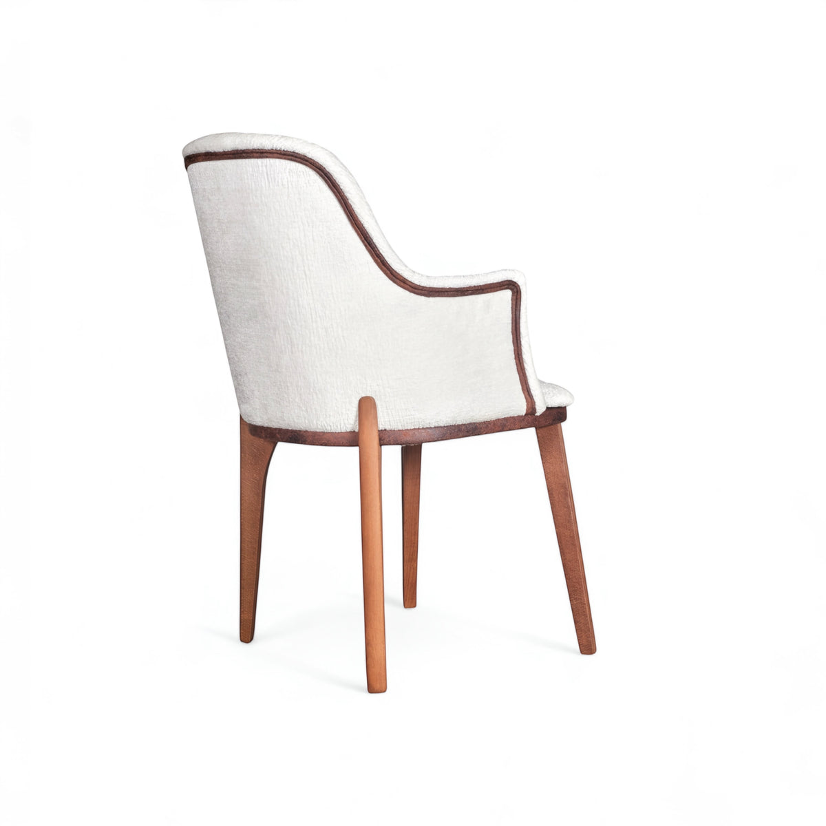 Rear angled view of the Vaya Home Cadena dining chair featuring white boucle upholstery, curved arms, and tapered wood legs.