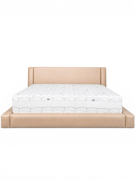 Front view of the Vaya Home Camelia upholstered platform bed with a low-profile frame and beige headboard.