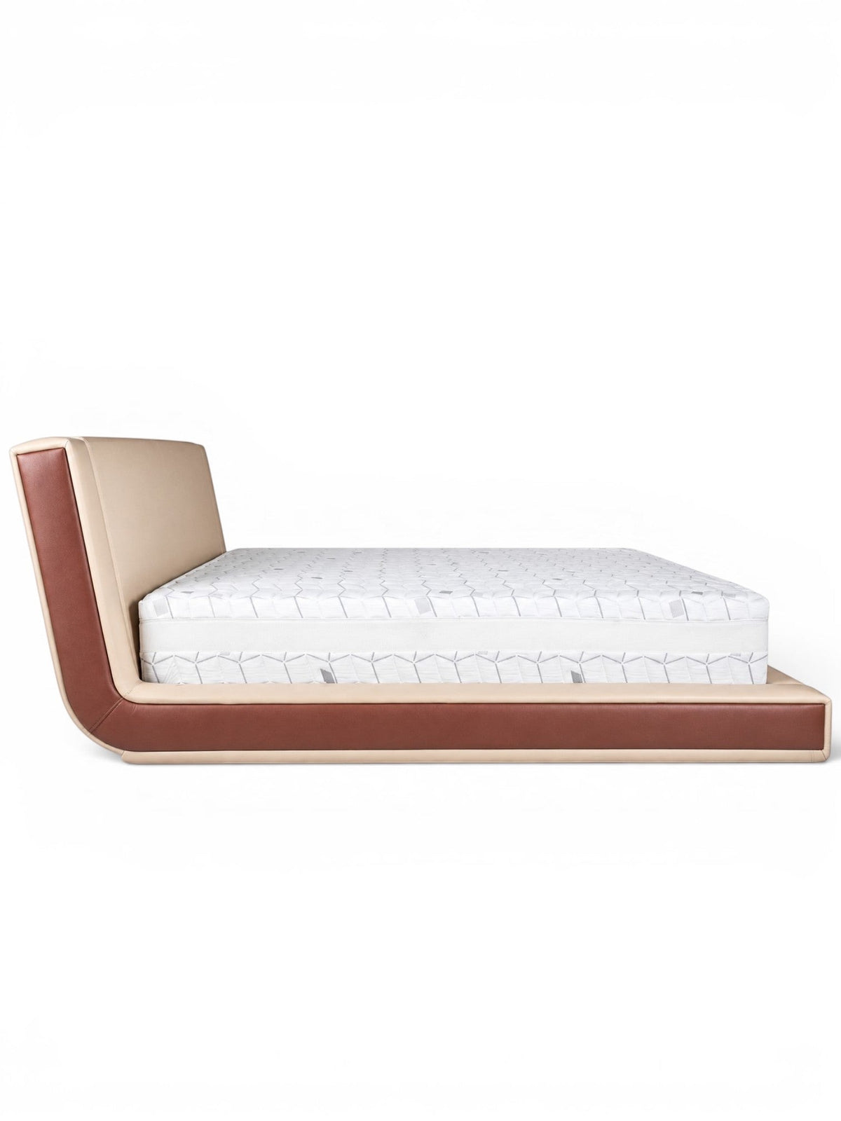 Side view of the Vaya Home Camelia bed featuring beige upholstery, a low platform frame, and warm brown side detailing.
