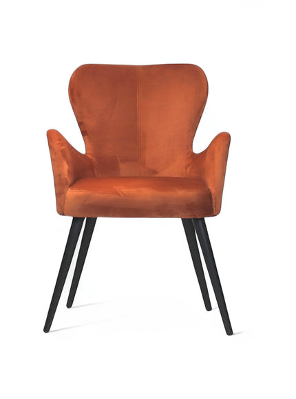 Front view of the Vaya Home Celebrity accent chair featuring orange upholstery, curved wings, and black tapered legs.