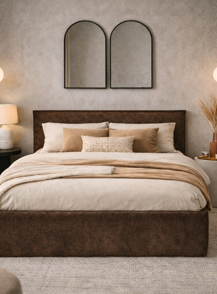 Vaya Home Chester upholstered bed in brown faux leather, styled in a modern bedroom.