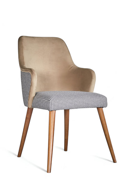 Front angled view of the Vaya Home Ciervo dining chair with houndstooth upholstery, curved arms, and tapered wood legs.
