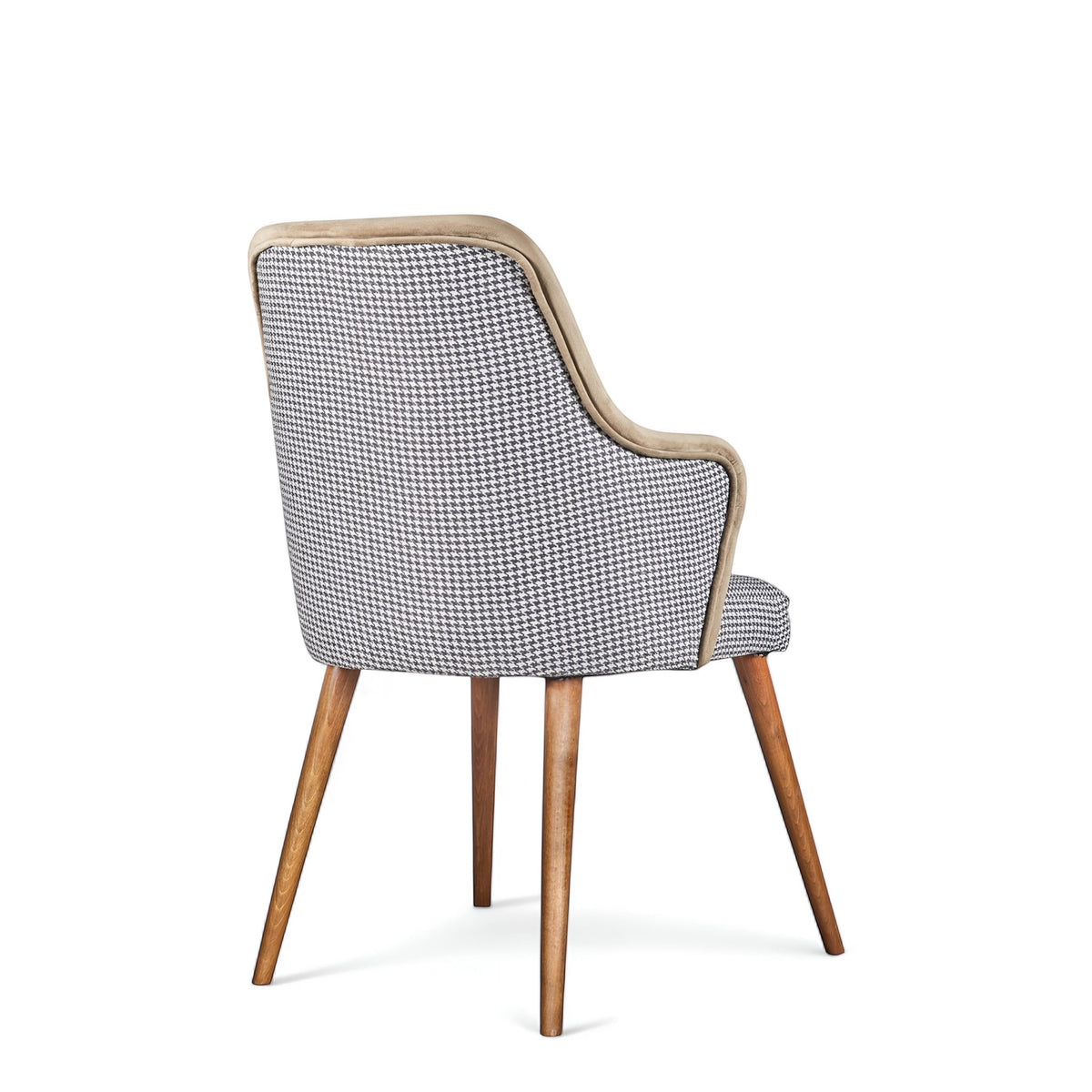 Rear angled view of the Vaya Home Ciervo dining chair featuring houndstooth upholstery and tapered wood legs.