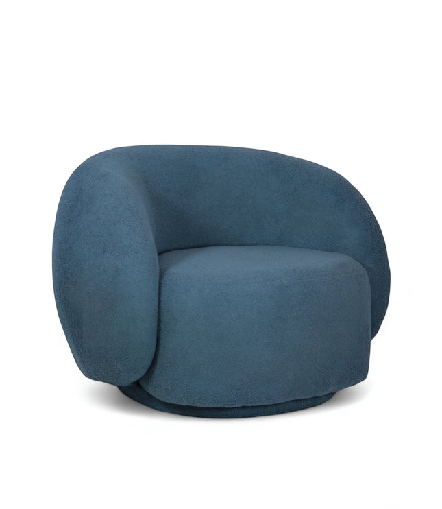 Product view of the Vaya Home Cloud accent chair in blue upholstery with a rounded back and plush seat cushion.