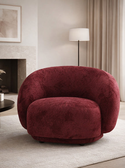 Vaya Home Cloud accent chair in red upholstery, styled in a modern living room.