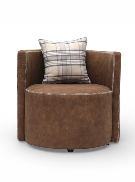 Front view of the Vaya Home Corvyn brown leather armchair with a rounded seat, curved back, and plaid accent cushion.