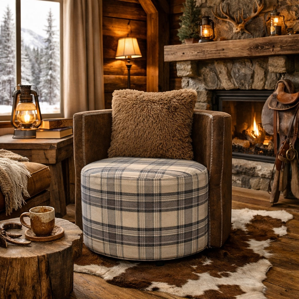 Vaya Home Corvyn armchair with a checkered upholstered seat and brown leather frame, styled in a warm rustic interior.