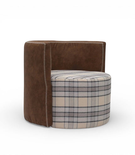 Side angled view of the Vaya Home Corvyn armchair showing a checkered upholstered seat and curved brown leather outer frame.