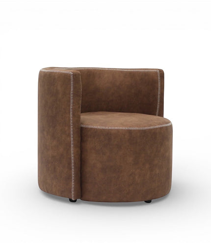 Side angled view of the Vaya Home Corvyn armchair with brown leather upholstery, rounded seat, and curved backrest.
