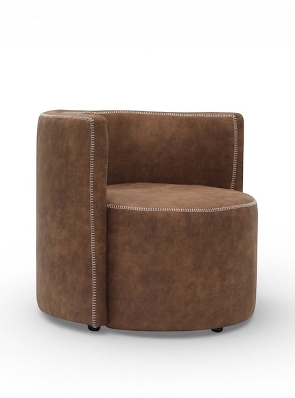 Side angled view of the Vaya Home Corvyn armchair with brown leather upholstery, rounded seat, and curved backrest.