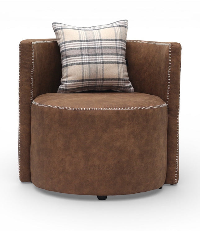 Front view of the Vaya Home Corvyn brown leather armchair with a rounded seat, curved back, and plaid accent cushion.