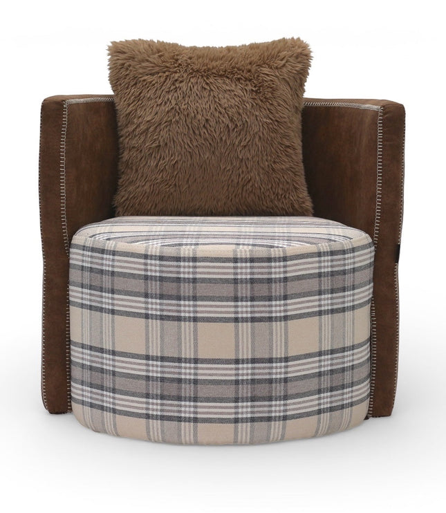 Front view of the Vaya Home Corvyn checkered armchair with a plaid upholstered seat, brown leather sides, and a textured accent cushion.