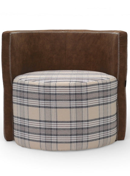 Front view of the Vaya Home Corvyn checkered armchair featuring a plaid upholstered seat, curved backrest, and brown leather outer frame.