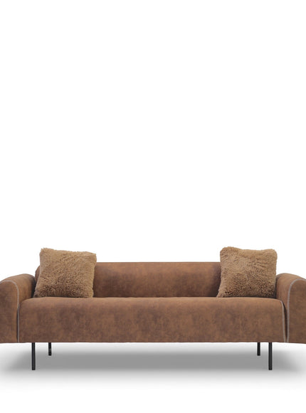 Front view of the Vaya Home Corvyn sofa with brown leather upholstery, slim arms, metal legs, and accent cushions.